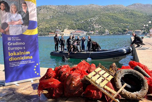 An underwater clean-up was organised by the City of Dubrovnik for the #EUBeachCleanup, divers are standing on a boat